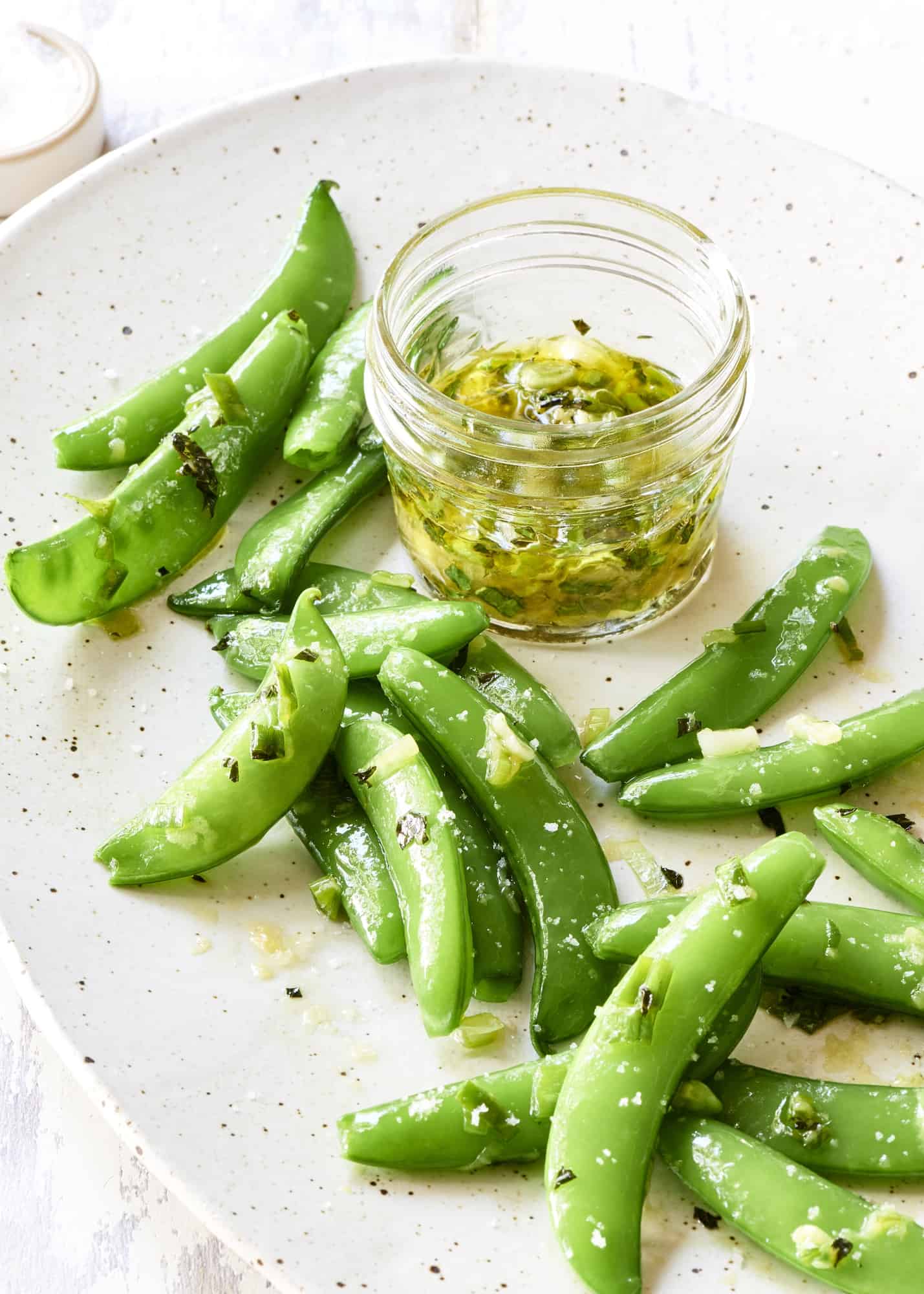 Sugar Snap Peas Recipe with Orange Ginger Dressing - The Blender Girl