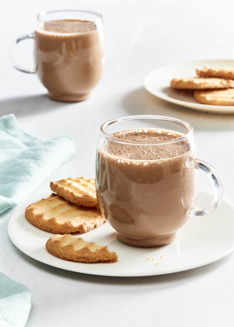 Vegan Hot Chocolate in a mug with cookies