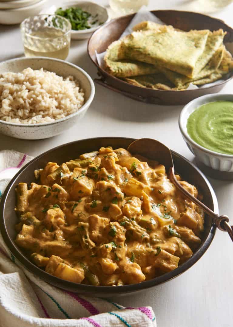 Vegan Potato Curry with Cauliflower and Green Beans with chutney and chickpea crepes