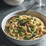 Creamy Vegan Roasted Garlic Pasta with Broccoli and Pine Nuts